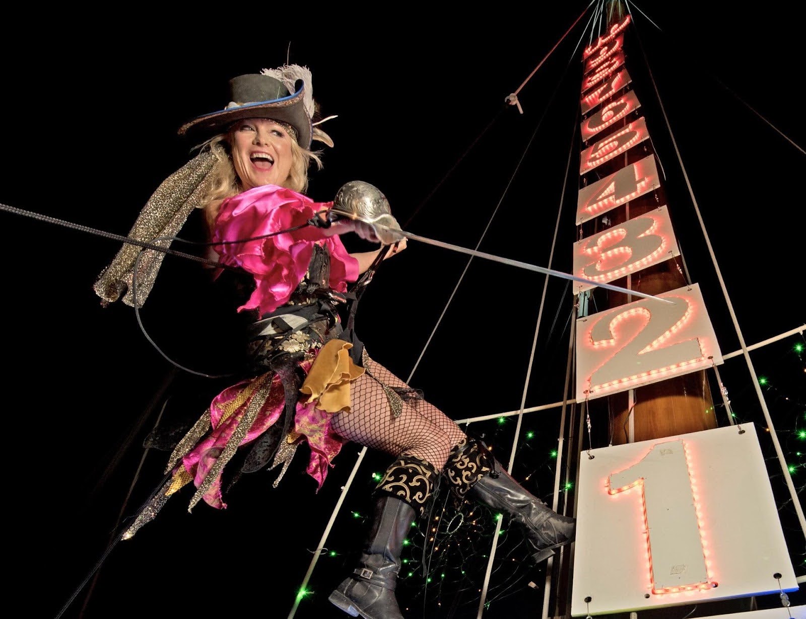 pirate woman swings from ropes