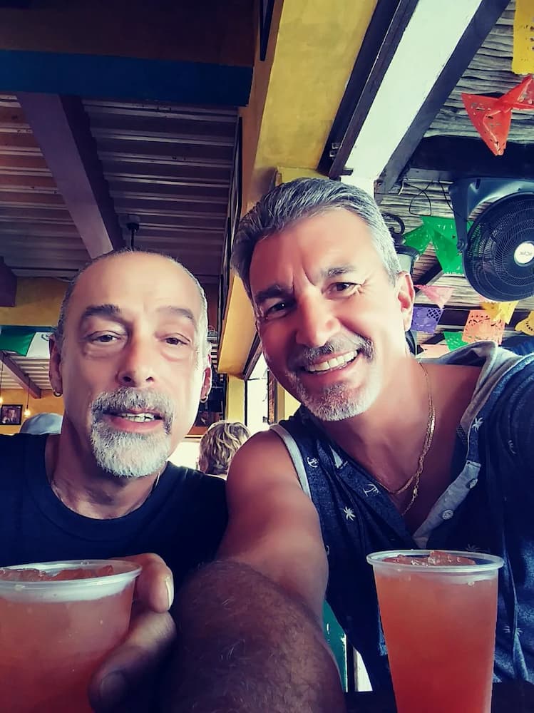 guys having drinks at a bar