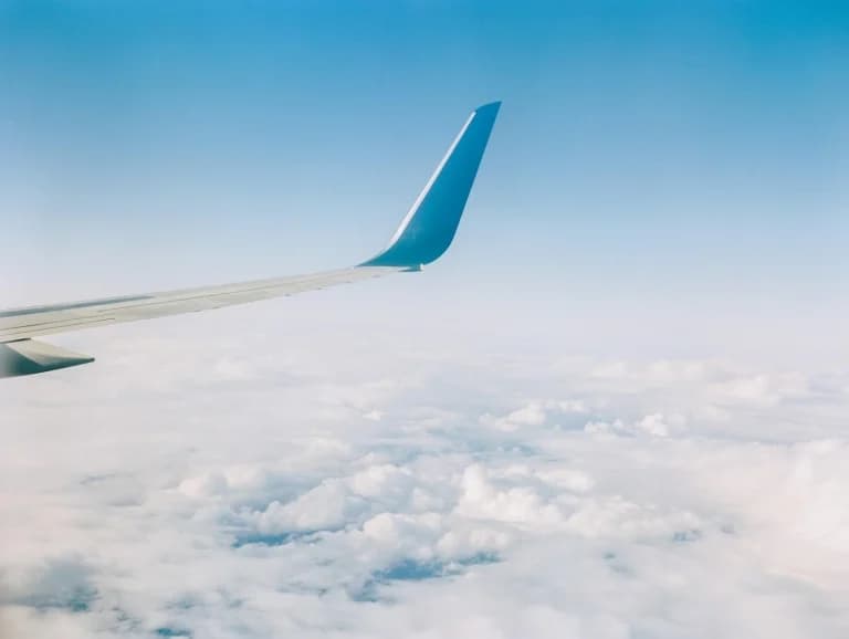 airplane wing in the sky